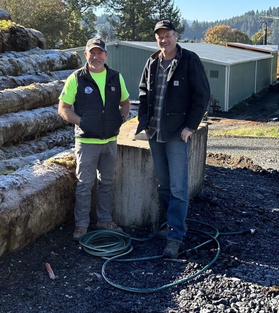 Patrick Lumber project lead Dennis Sanders (left) and CEO Dave Halsey on site at Patrick Lumber Manufacturing in Philomath, Ore., where a new 150,000 bf per month hardwood mill is currently being built. The project is funded in part by a $1 million USDA Forest Service Community Wood Grant.